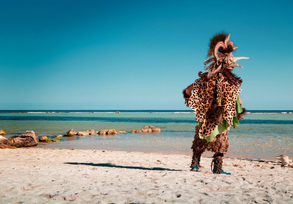 A Mayan dancer on the beach in Mahahual