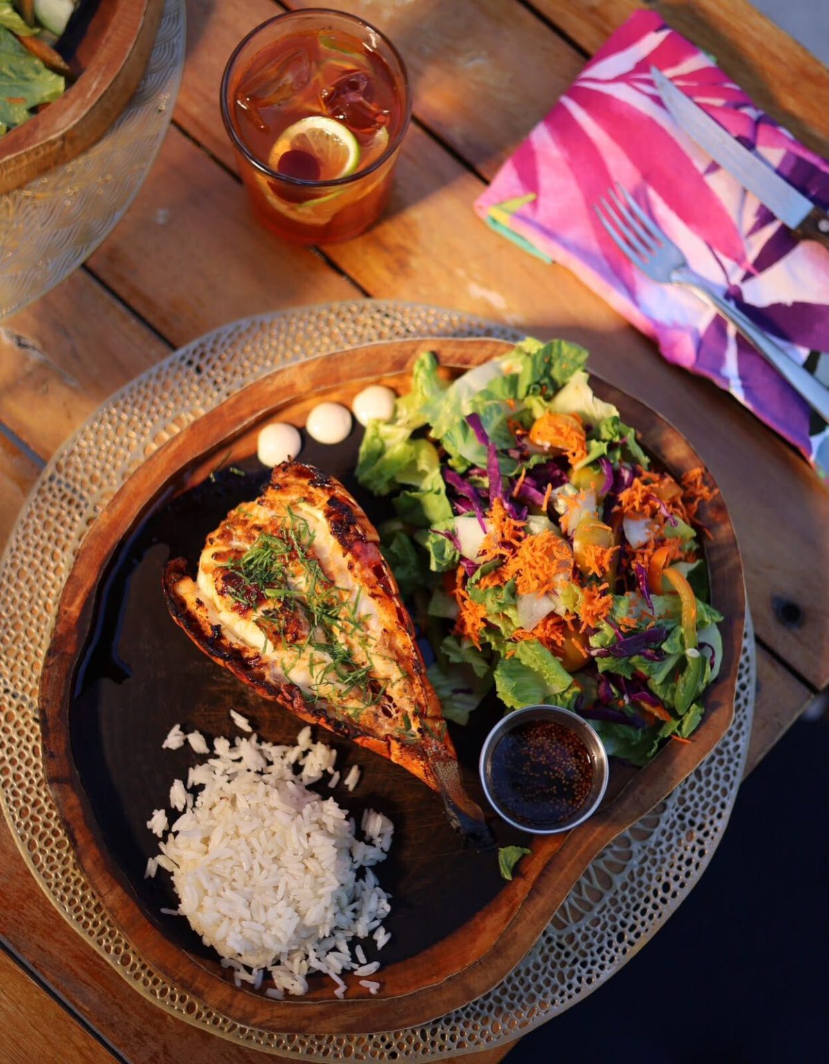 Grilled Caribbean lobster with rice and salad
