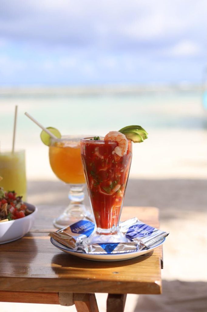 A shrimp cocktail with the beach beyond