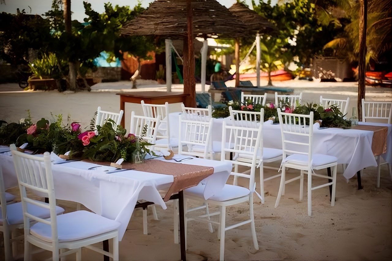 A beachfront celebration set up on the sand